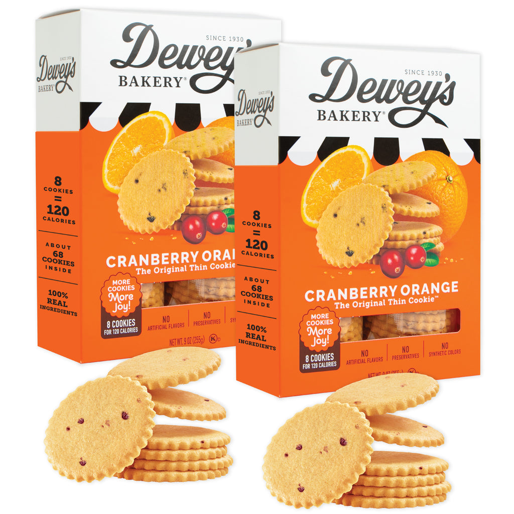 Two boxes of Dewey's Bakery Cranberry Orange cookies with cookies in front on a white background