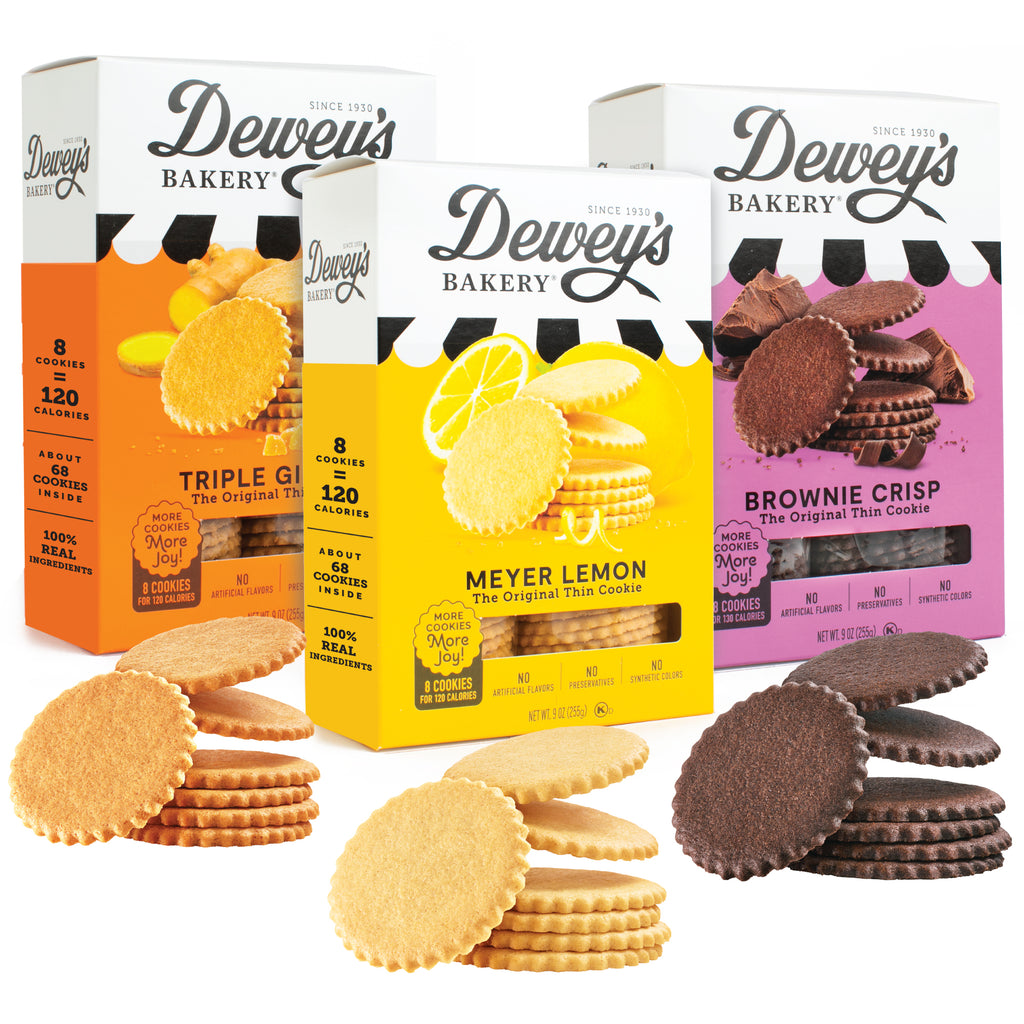 Three boxes of Dewey's Bakery cookies, flavors include Meyer Lemon, Triple Ginger, and Brownie Crisp. The boxes are displayed with the corresponding cookies in front of each box.